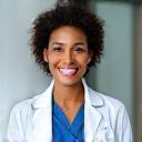 Young resident physician smiling confidently, looking towards a bright future.